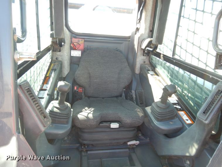 image for item DG6330 2011 John Deere 323D  tracked skid steer loader