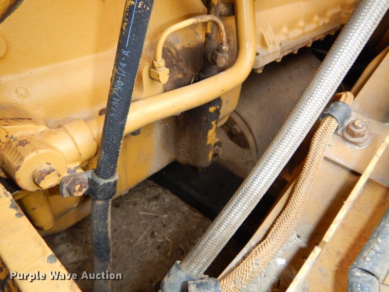 image for item DH4411 1991 Caterpillar 815B soil compactor