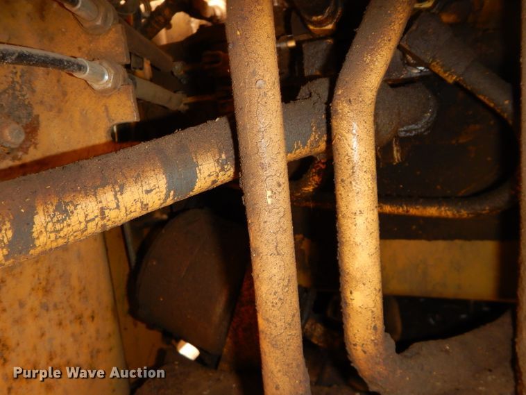 image for item DH4411 1991 Caterpillar 815B soil compactor