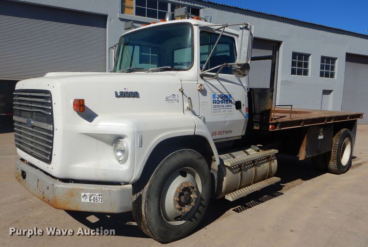 image for item DH4433 1991 Ford L9000 flatbed truck
