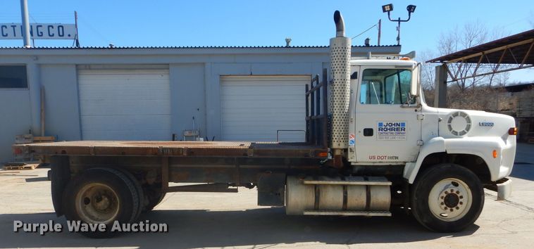 image for item DH4433 1991 Ford L9000 flatbed truck