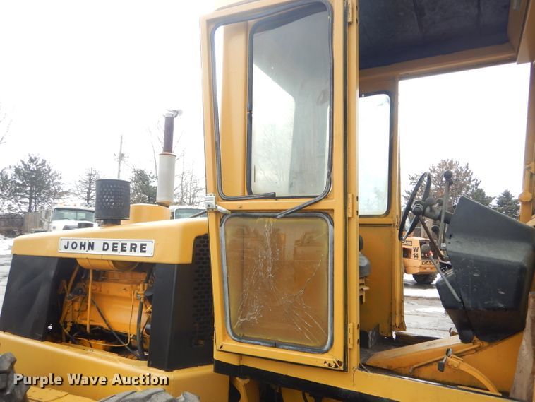 image for item DH6436 John Deere 570 motor grader