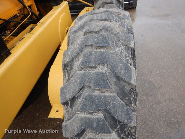 image for item DH6436 John Deere 570 motor grader