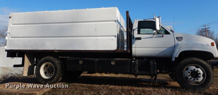 image for item GB9790 1999 GMC C6500 chip bed truck
