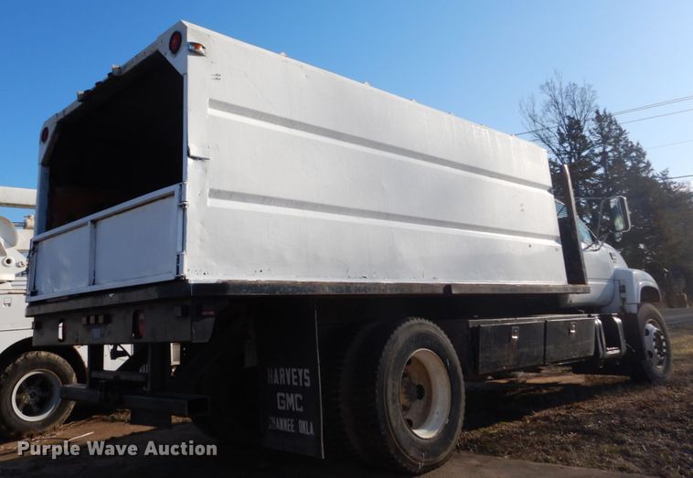 image for item GB9790 1999 GMC C6500 chip bed truck