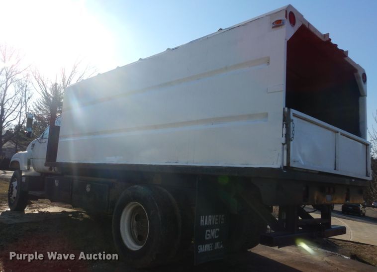 image for item GB9790 1999 GMC C6500 chip bed truck
