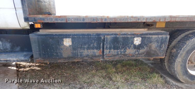 image for item GB9790 1999 GMC C6500 chip bed truck