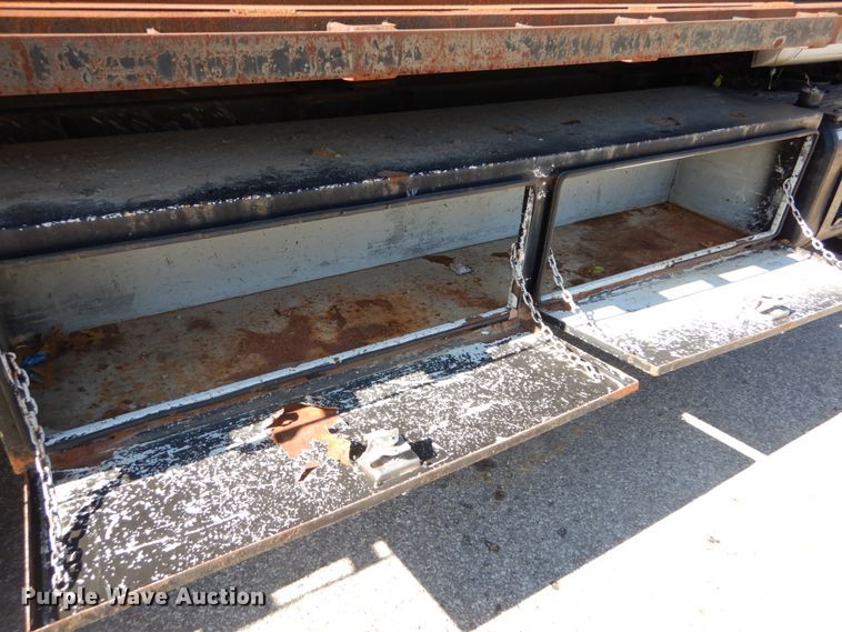 image for item GB9790 1999 GMC C6500 chip bed truck