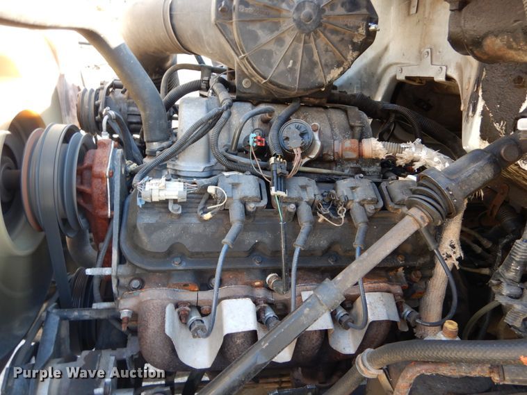 image for item GB9790 1999 GMC C6500 chip bed truck