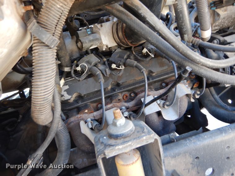 image for item GB9790 1999 GMC C6500 chip bed truck