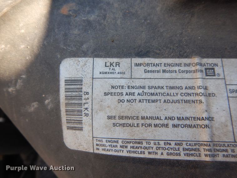 image for item GB9790 1999 GMC C6500 chip bed truck