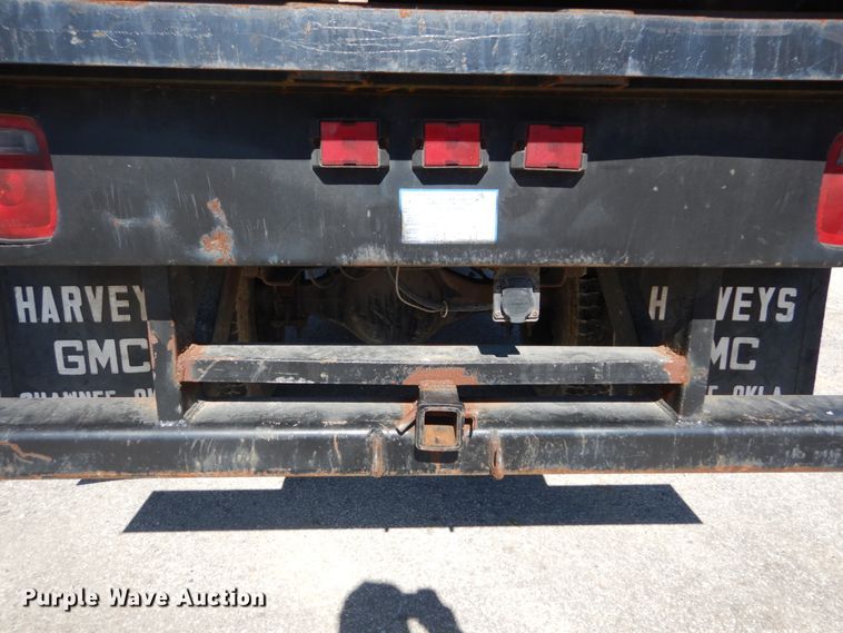 image for item GB9790 1999 GMC C6500 chip bed truck