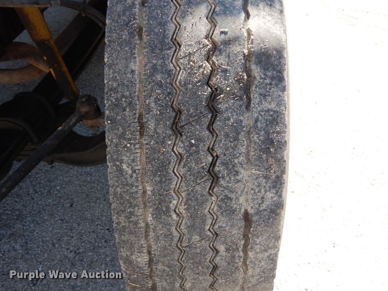 image for item GB9790 1999 GMC C6500 chip bed truck