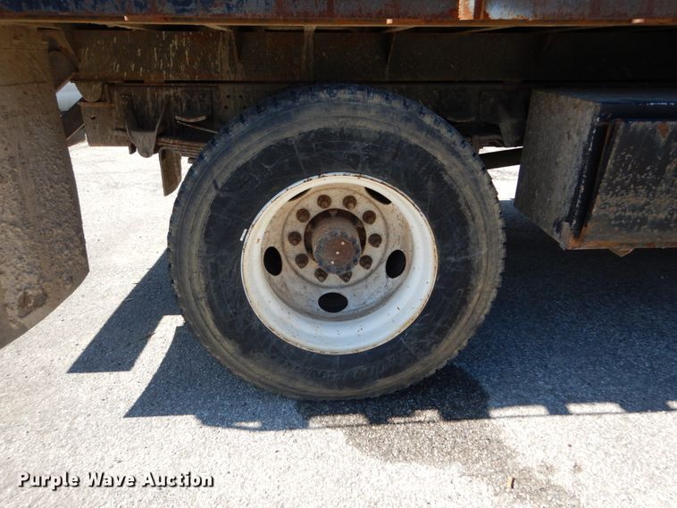 image for item GB9790 1999 GMC C6500 chip bed truck