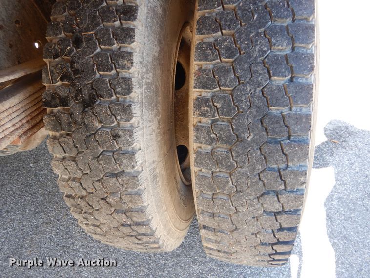 image for item GB9790 1999 GMC C6500 chip bed truck