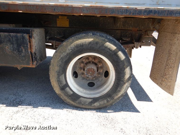 image for item GB9790 1999 GMC C6500 chip bed truck