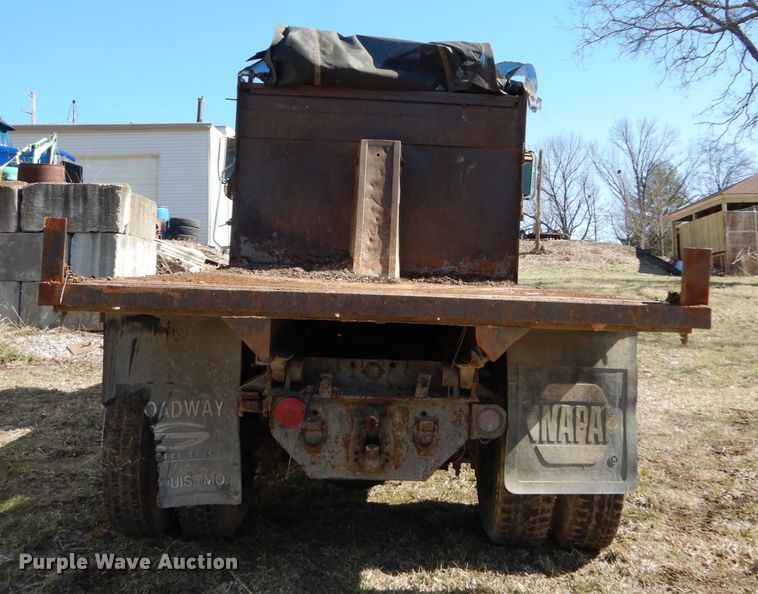 image for item GB9795 1990 Ford L9000 flat dump bed truck