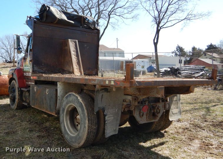 image for item GB9795 1990 Ford L9000 flat dump bed truck