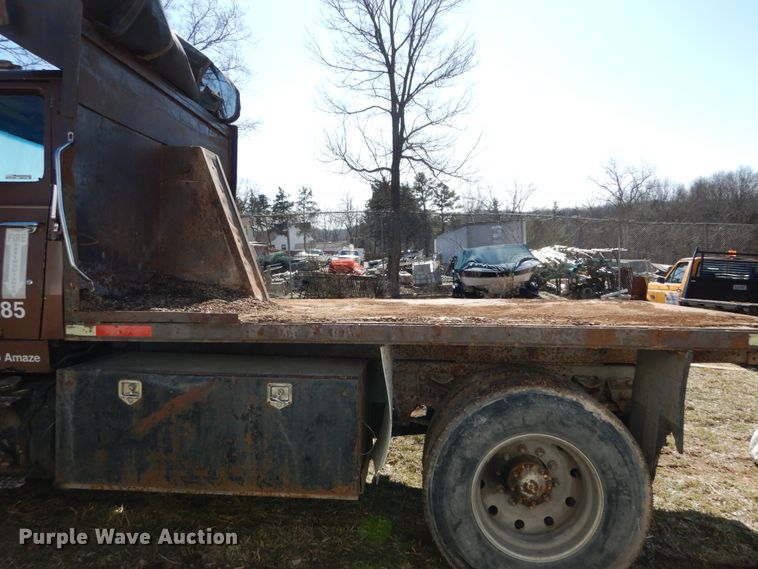 image for item GB9795 1990 Ford L9000 flat dump bed truck