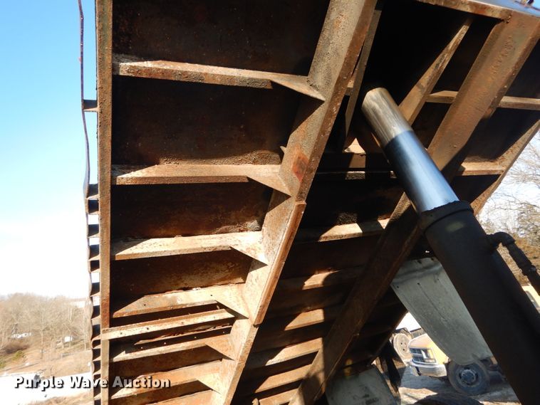 image for item GB9795 1990 Ford L9000 flat dump bed truck