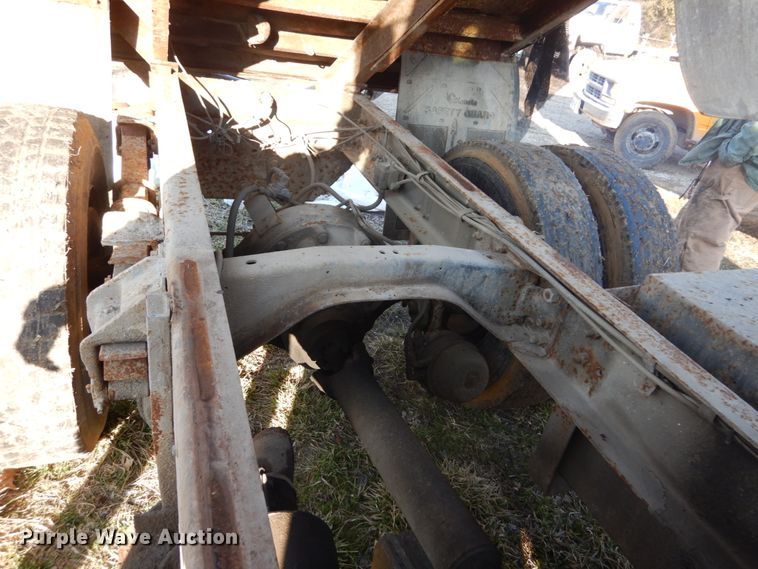 image for item GB9795 1990 Ford L9000 flat dump bed truck