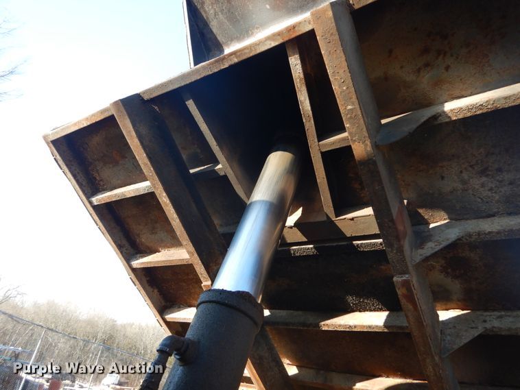 image for item GB9795 1990 Ford L9000 flat dump bed truck