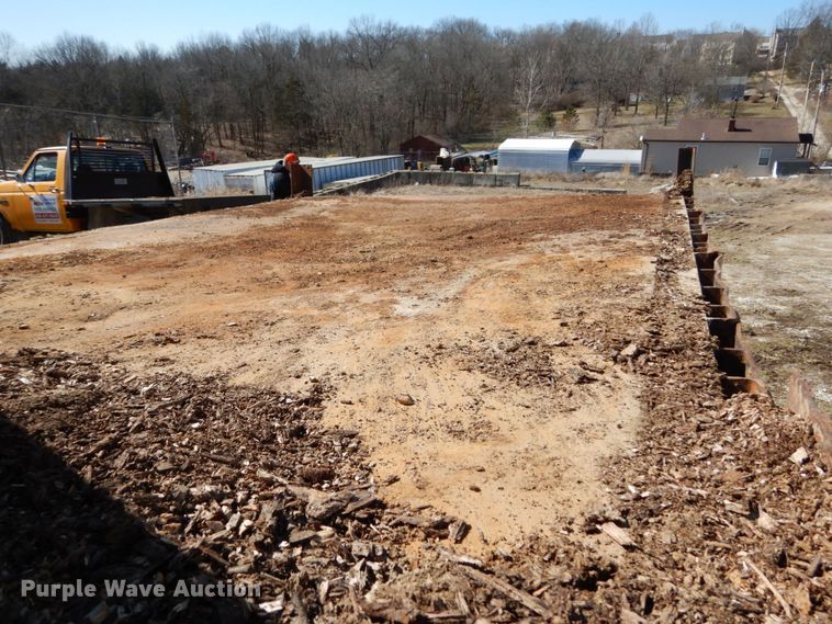 image for item GB9795 1990 Ford L9000 flat dump bed truck