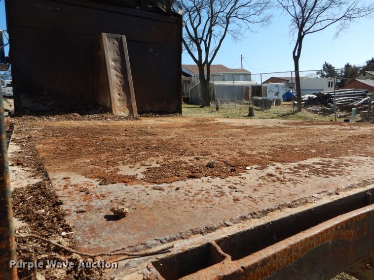 image for item GB9795 1990 Ford L9000 flat dump bed truck