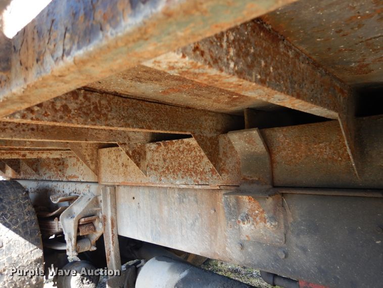 image for item GB9795 1990 Ford L9000 flat dump bed truck