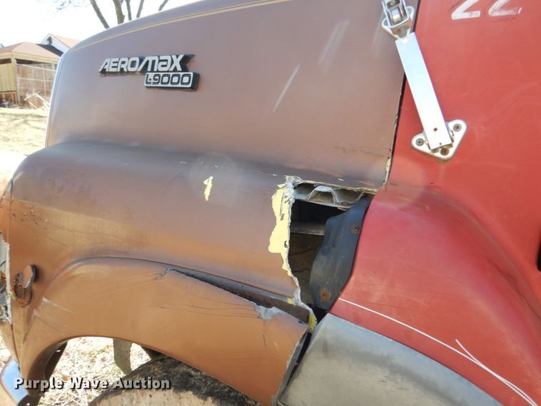 image for item GB9795 1990 Ford L9000 flat dump bed truck