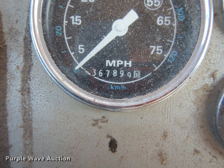 image for item GB9795 1990 Ford L9000 flat dump bed truck