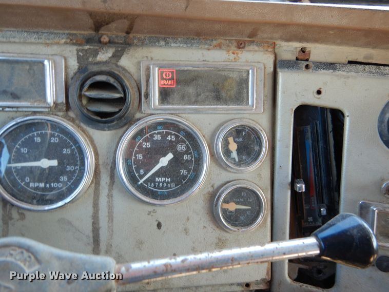 image for item GB9795 1990 Ford L9000 flat dump bed truck