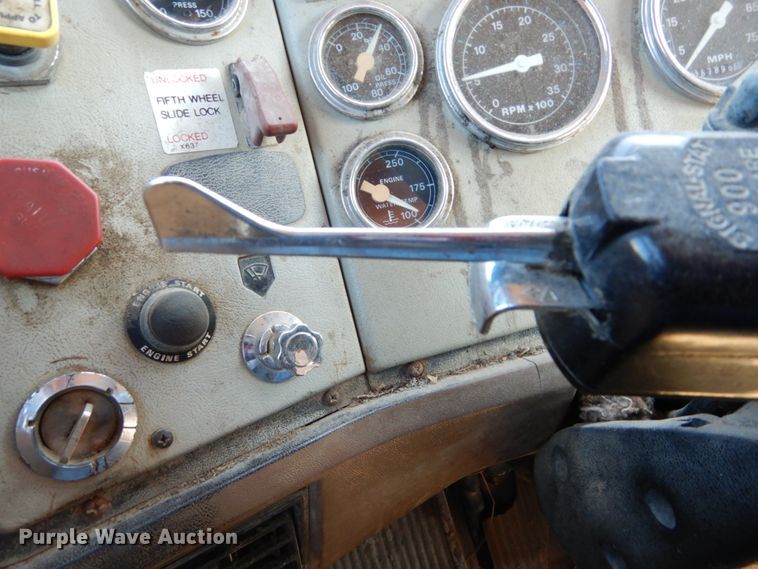 image for item GB9795 1990 Ford L9000 flat dump bed truck