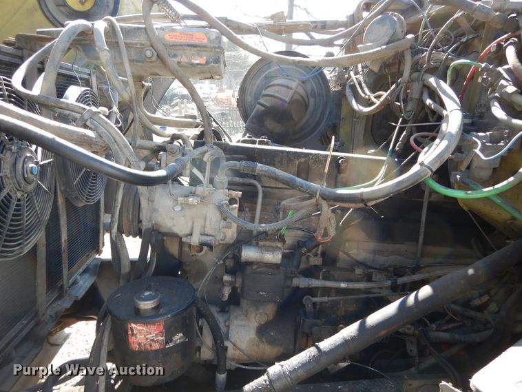 image for item GB9795 1990 Ford L9000 flat dump bed truck