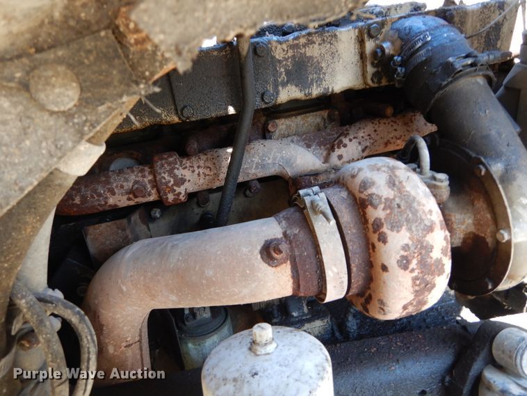 image for item GB9795 1990 Ford L9000 flat dump bed truck