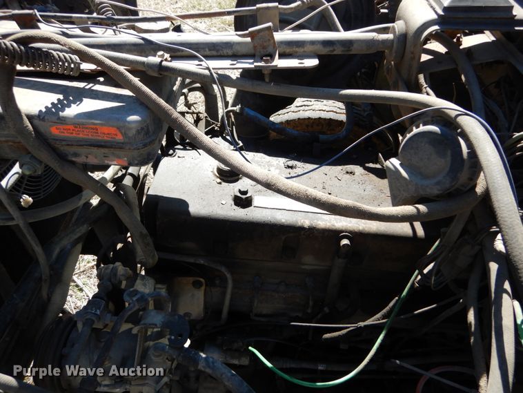 image for item GB9795 1990 Ford L9000 flat dump bed truck