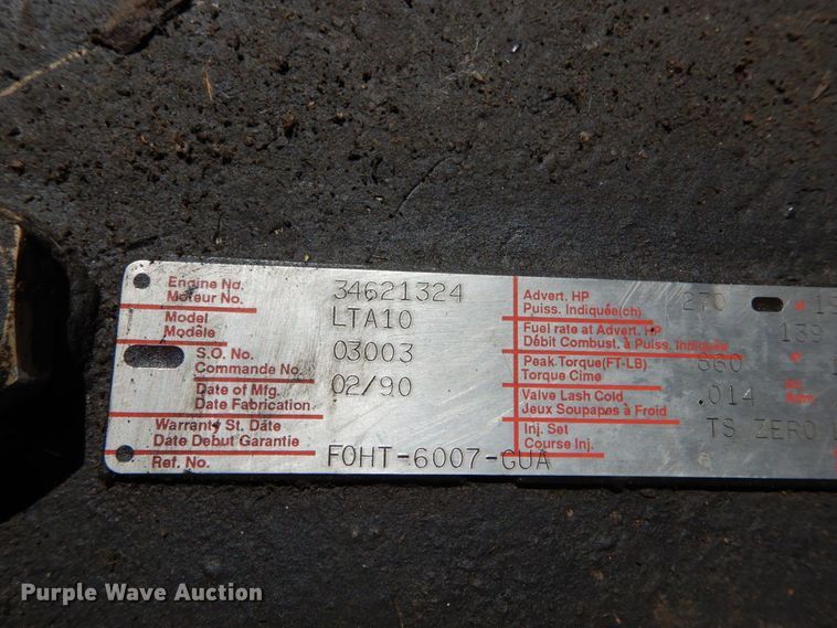 image for item GB9795 1990 Ford L9000 flat dump bed truck