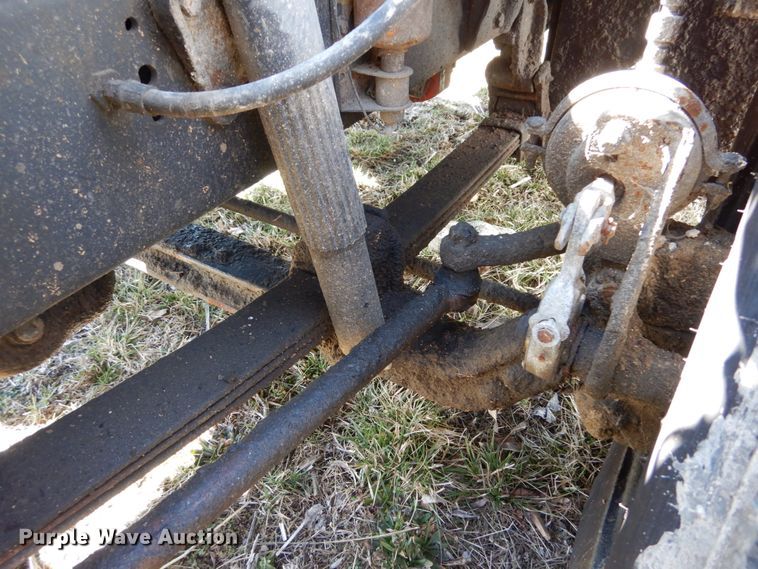 image for item GB9795 1990 Ford L9000 flat dump bed truck