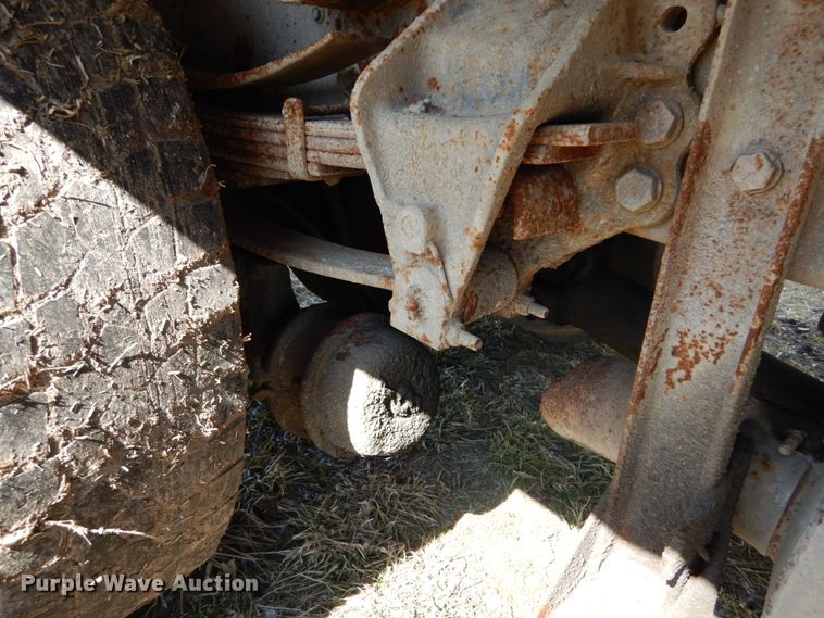 image for item GB9795 1990 Ford L9000 flat dump bed truck