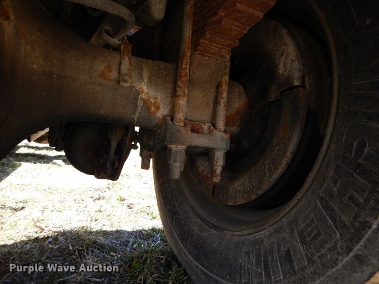 image for item GB9795 1990 Ford L9000 flat dump bed truck