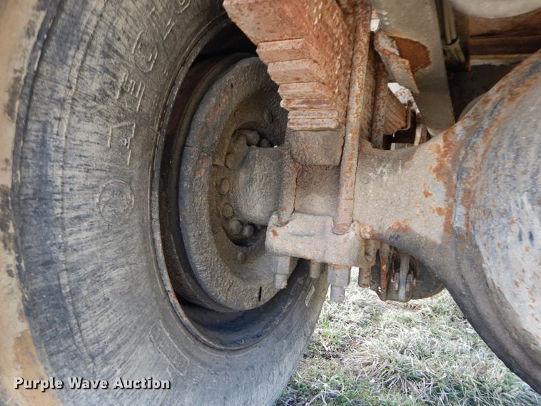 image for item GB9795 1990 Ford L9000 flat dump bed truck