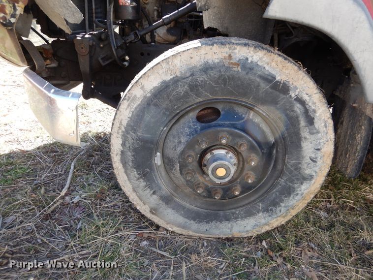 image for item GB9795 1990 Ford L9000 flat dump bed truck