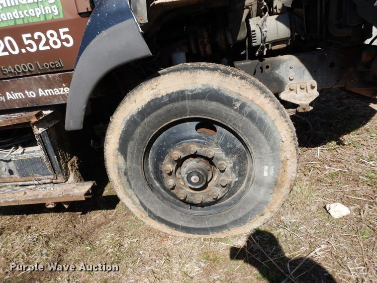 image for item GB9795 1990 Ford L9000 flat dump bed truck