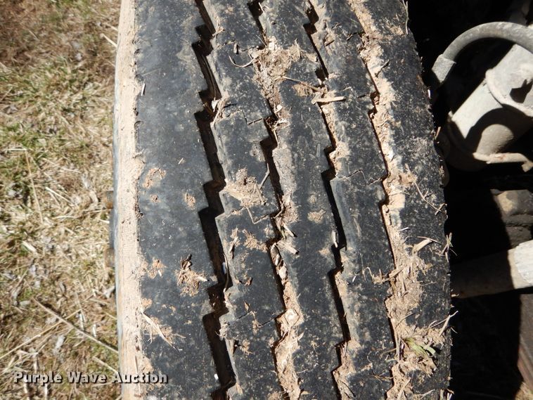 image for item GB9795 1990 Ford L9000 flat dump bed truck