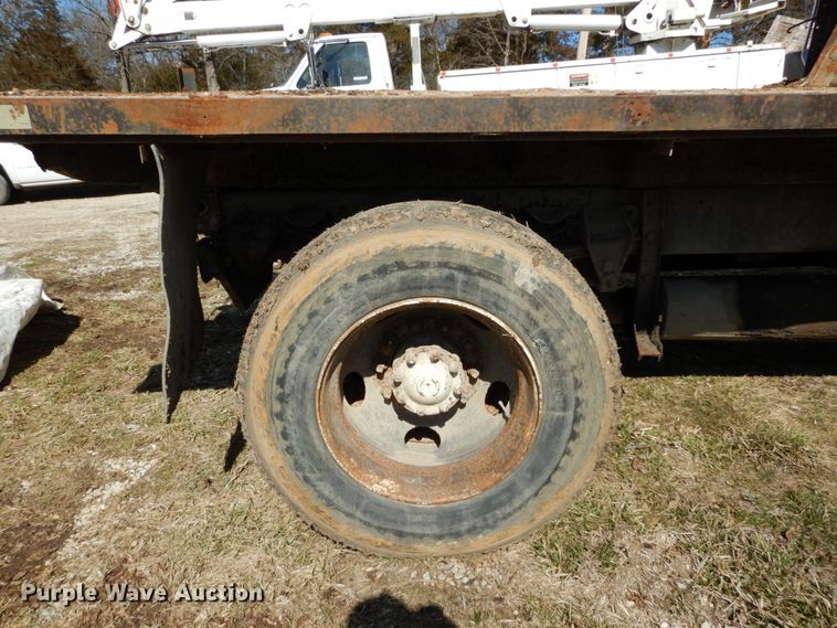 image for item GB9795 1990 Ford L9000 flat dump bed truck