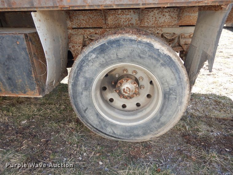 image for item GB9795 1990 Ford L9000 flat dump bed truck