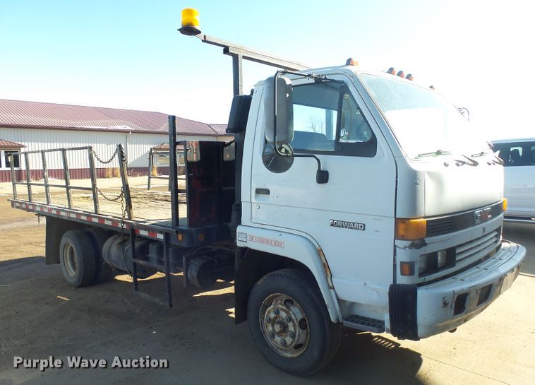 image for item GV9756 1994 GMC W5 flatbed truck