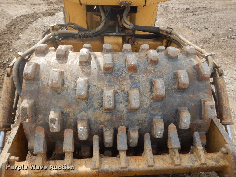 image for item GW9495 1996 Caterpillar CP-323 single drum vibratory roller