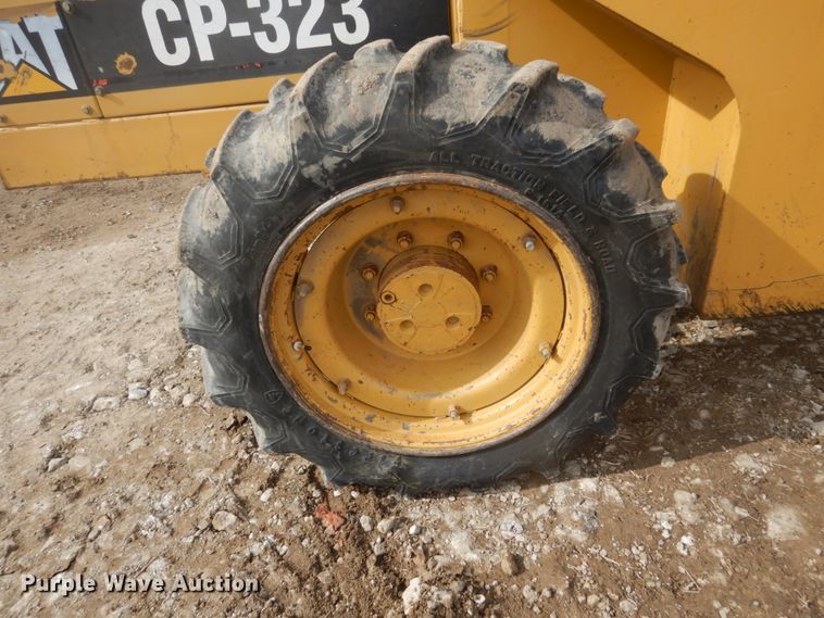 image for item GW9495 1996 Caterpillar CP-323 single drum vibratory roller