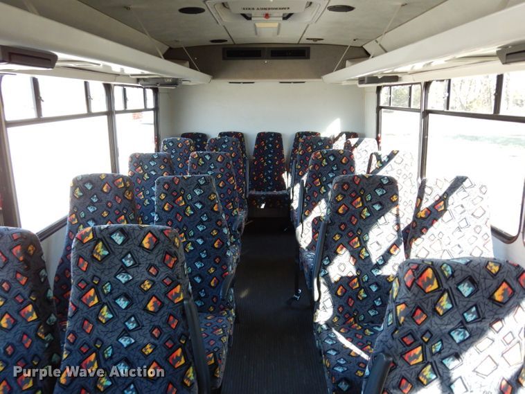 image for item DG6283 2005 GMC C5500 shuttle bus